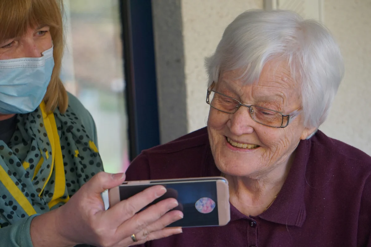 Caregiver assisting with daily activities